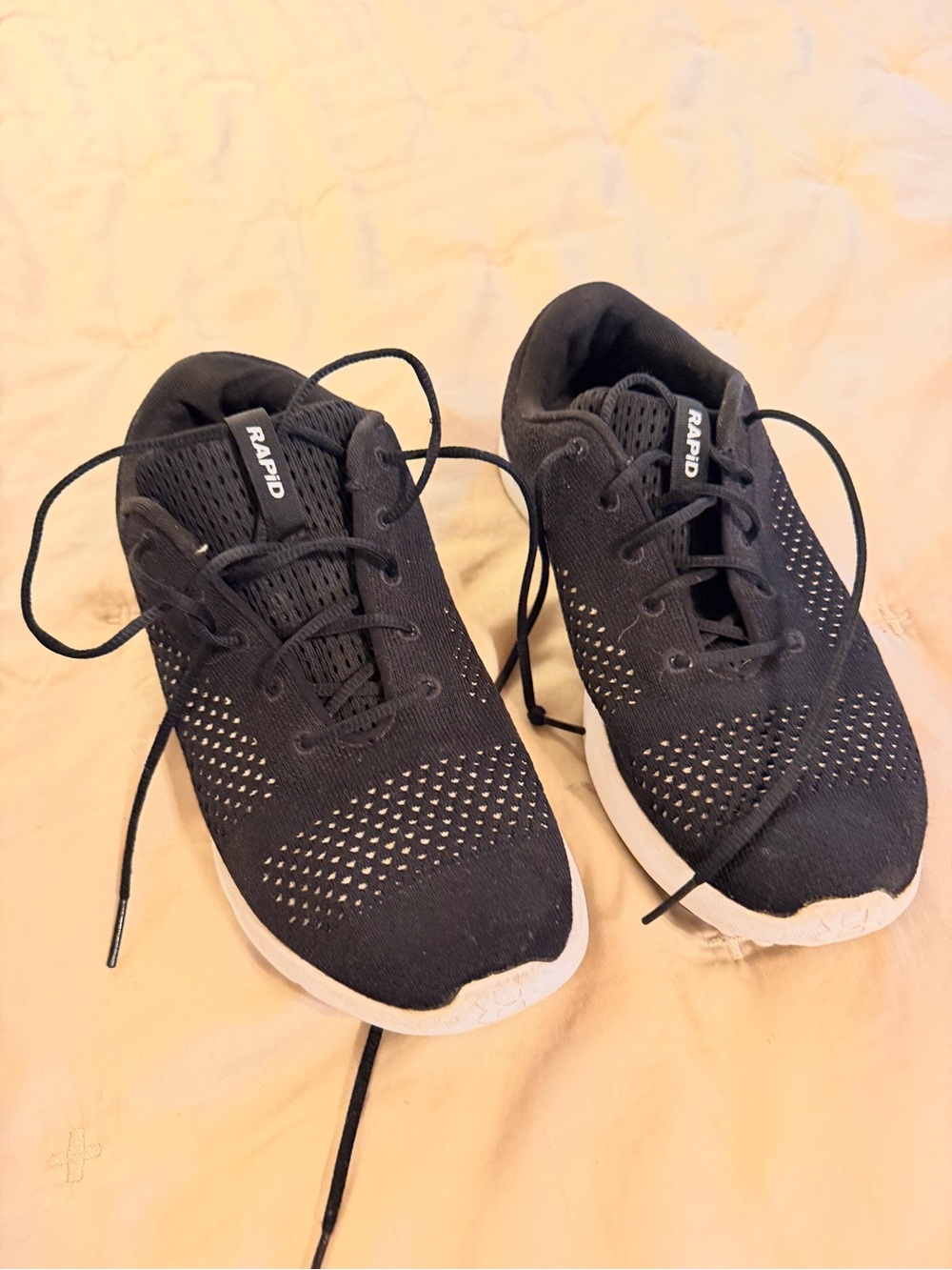 Under Armour women’s Black Knit Sneakers with White Soles
